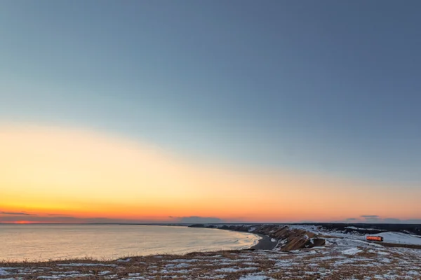 投稿：厳寒の海と夕日と根室本線