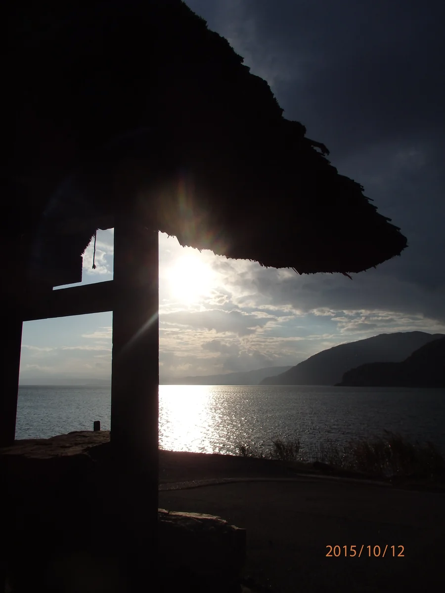 投稿写真：菅浦の夕日、四足門より