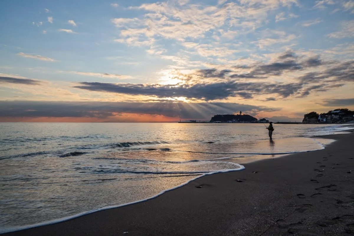 投稿写真：夕日と釣り人